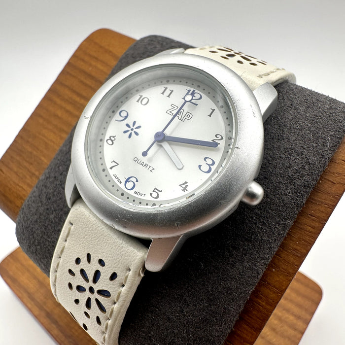 ZAP Quartz Watch Silver Tone Case White Floral Cutout Leather Strap