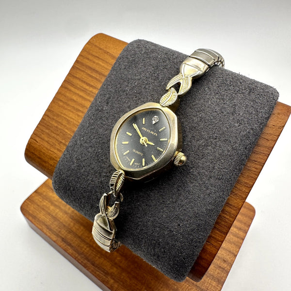 Milan Vintage Women's Quartz Watch Black Dial Faded Gold Tone Leaf Bracelet